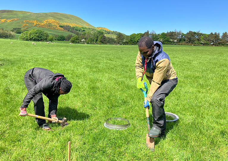 Angeline Kanneh and Louis Addo of the University of Liberia learning to measure greenhouse gas movements 