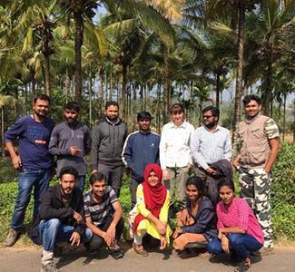 Group of people in front of trees
